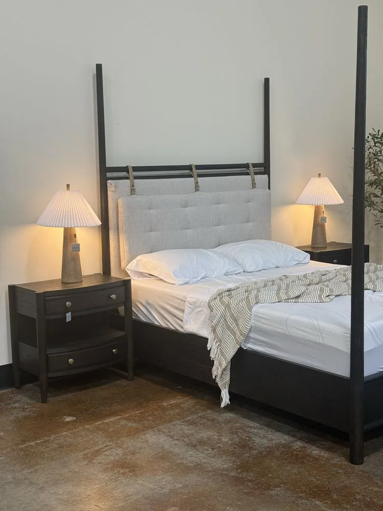 Four-poster bed styled in a Norhaus Furniture bedroom display