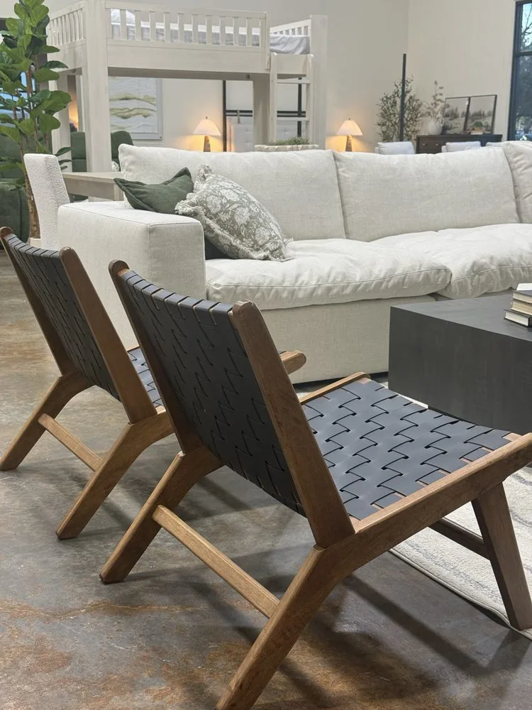 Lounge chairs and a sofa arranged in the Norhaus showroom